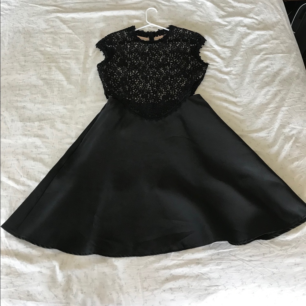 Lace top black cap sleeve dress with pocket